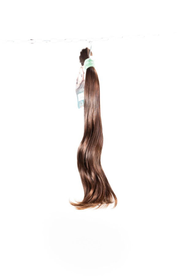 Přírodní hnědé vlnité vlasy k prodlužování vlasů.